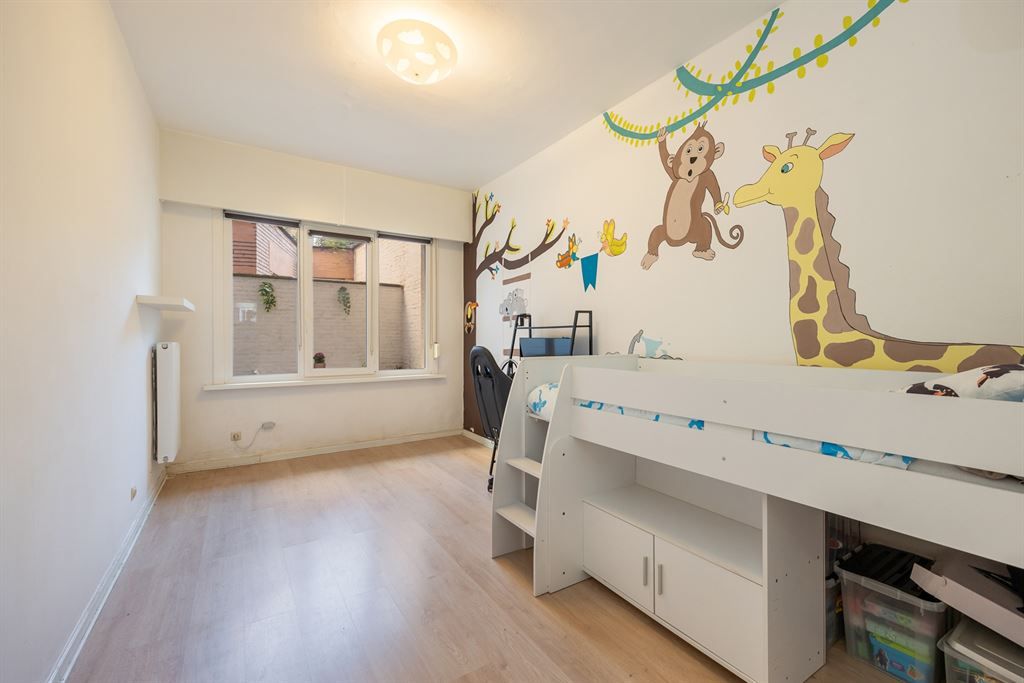 Instapklaar gelijkvloersappartement met stadskoer foto 12