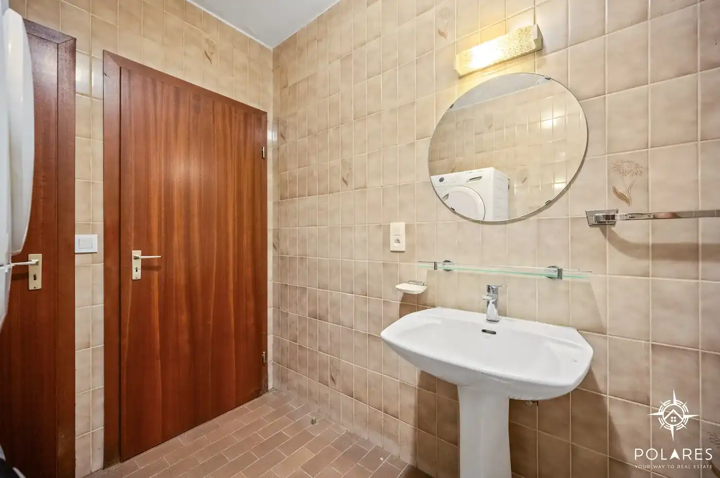Ruim gelijkvloers appartement met 2 slaapkamers, garage en kelder foto 11