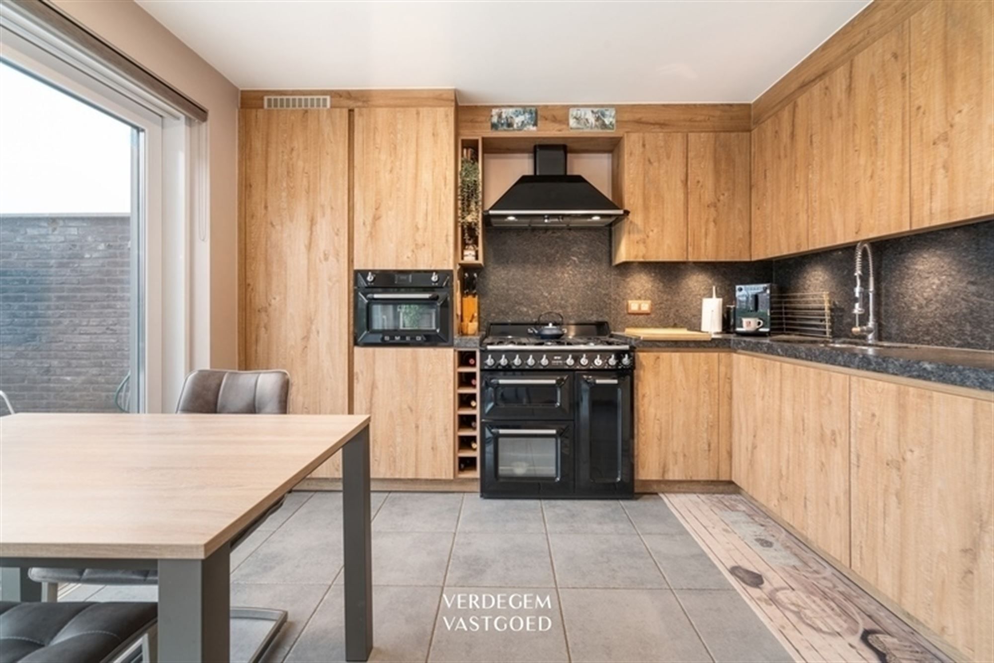 Mooie familiewoning met 4 slaapkamers en zuid tuin foto 2