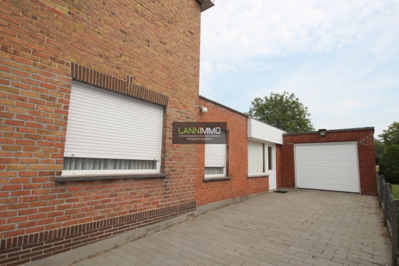 Halfopen huis met 3 slaapkamers en leuke tuin foto 2