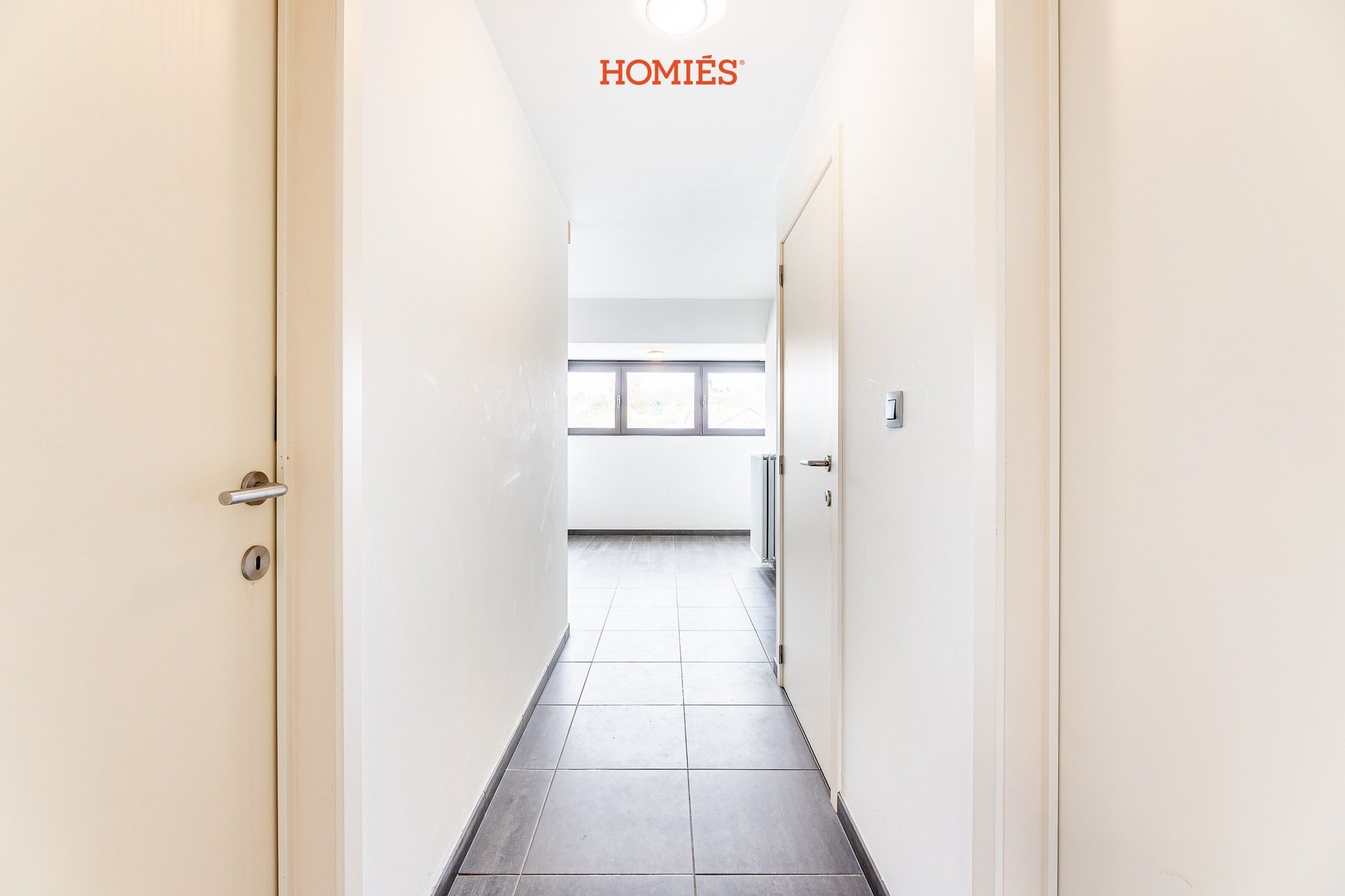 Ruim triplex appartement op strategische locatie foto 8