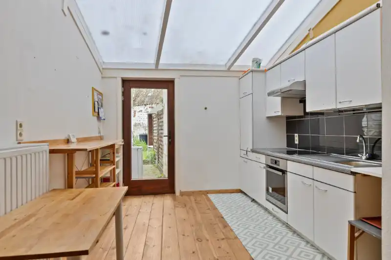 Gezellige stadswoning met 2 slaapkamers en tuin foto 3