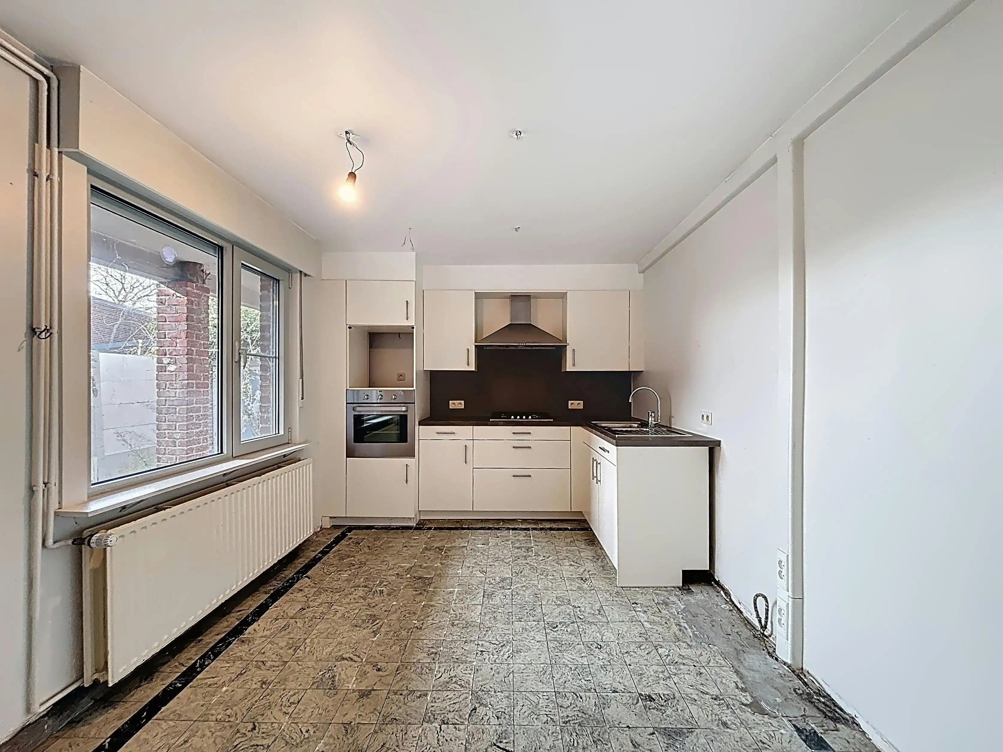 Te renoveren halfopen bebouwing te koop in Lotenhulle foto 8