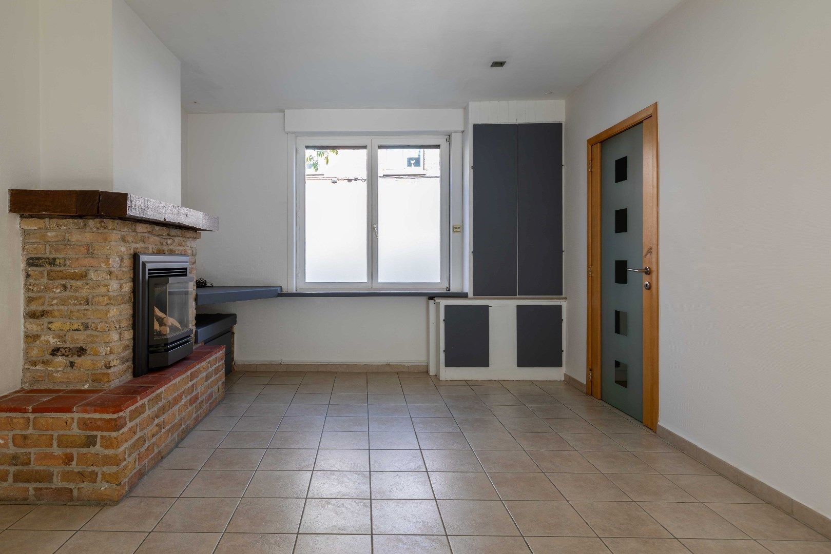 Centraal en rustig gelegen vernieuwde woning met groot zonneterras op enkele passen van de Katelijnepoort. foto 4
