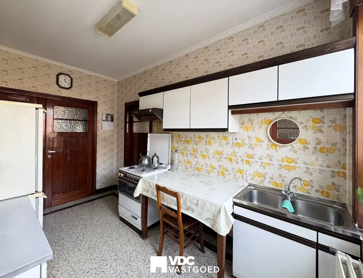 Charmante te renoveren woning met tuin, garage en sterk investeringspotentieel foto 5