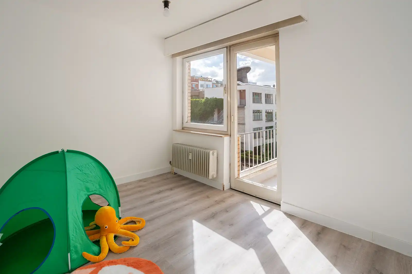 Drie slaapkamers, twee terrassen, één centrale ligging foto 15