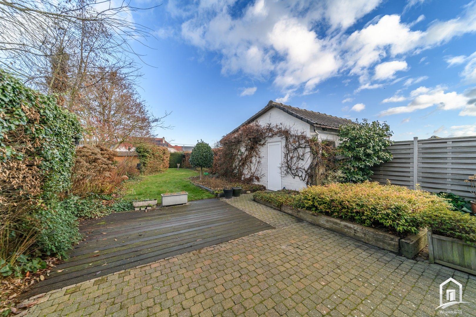 Instapklare halfopen bebouwing met tuin en garages in Denderleeuw foto 5