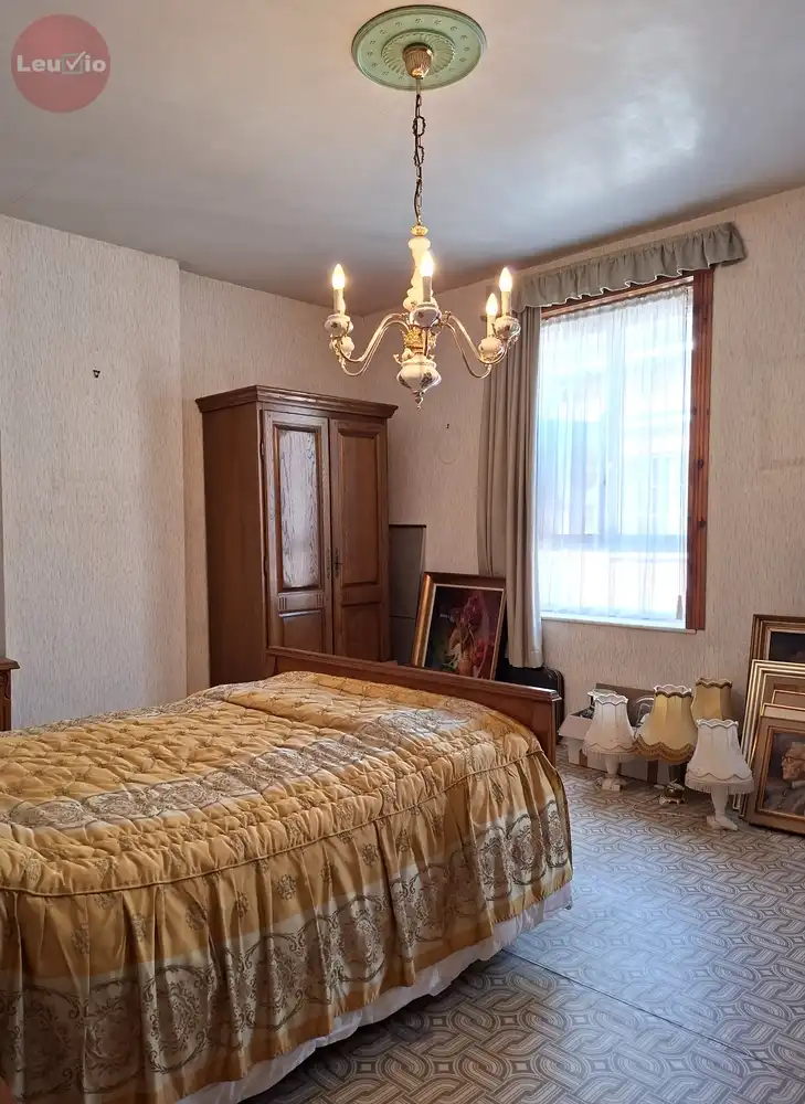 Goed gelegen woning // 2 slaapkamers + zolder om af te werken foto 28