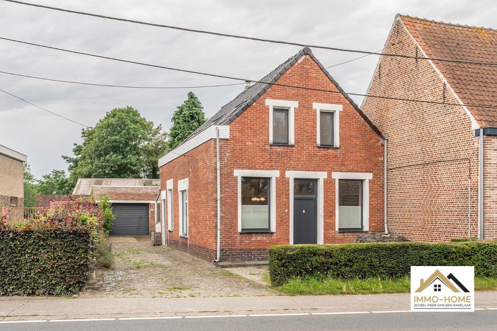 Hoofdfoto van de publicatie: Instapklare woning met ruime tuin en garage te Beervelde