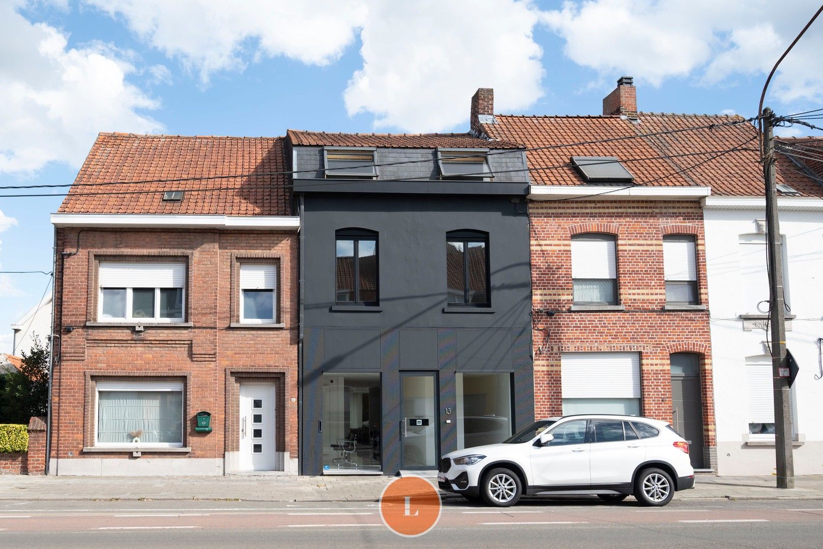Handelspand met woonst te koop – instapklaar en centraal gelegen foto {{pictureIndex}}