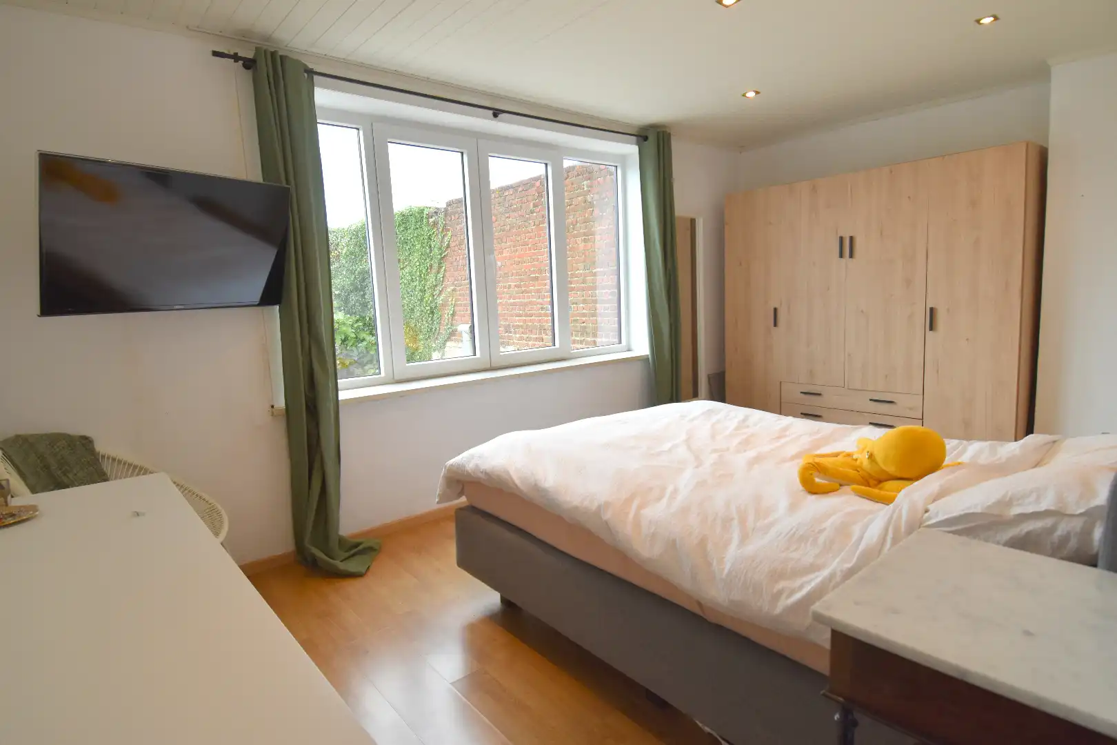 Instapklare woning met 4 slaapkamers en gezellige stadstuin te koop in hartje Kortrijk foto 12