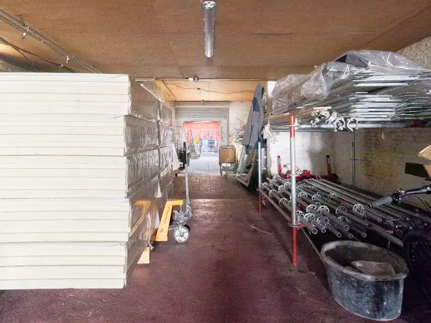 Opbrengsteigendom met ruim magazijn en appartement. foto 12