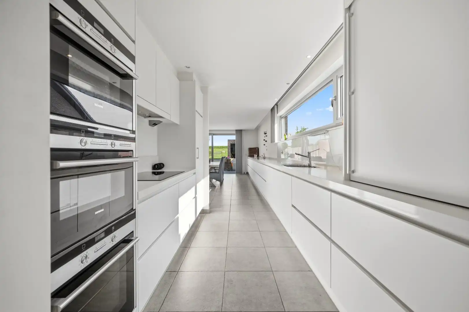Mooie instapklare woning met tuin, terras, garage en 4 slpks foto 4