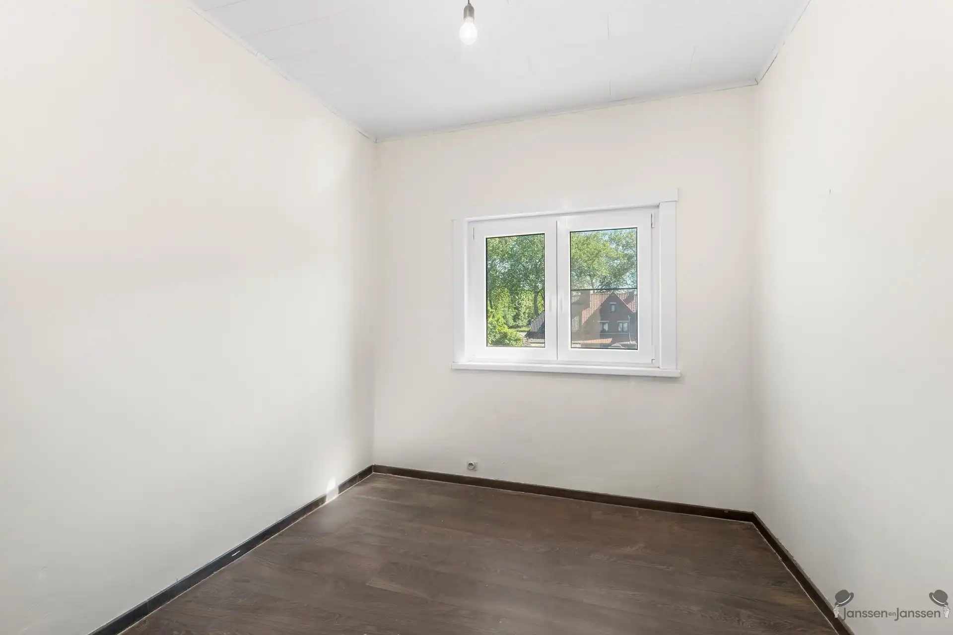 Charmante rijwoning met tuin in het groene Waterschei foto 15