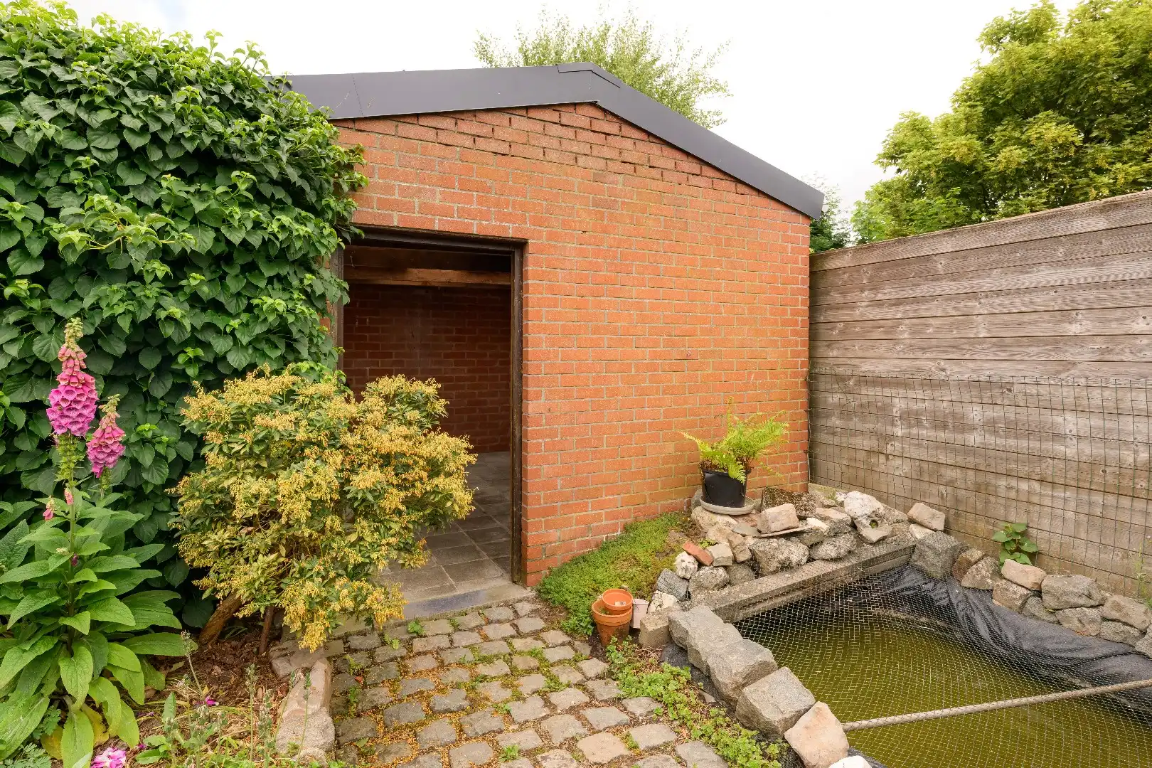 RUIME GEZINSWONING MET 4 SLPKS IN RUSTIGE WOONWIJK | GARAGE | TUIN foto 7