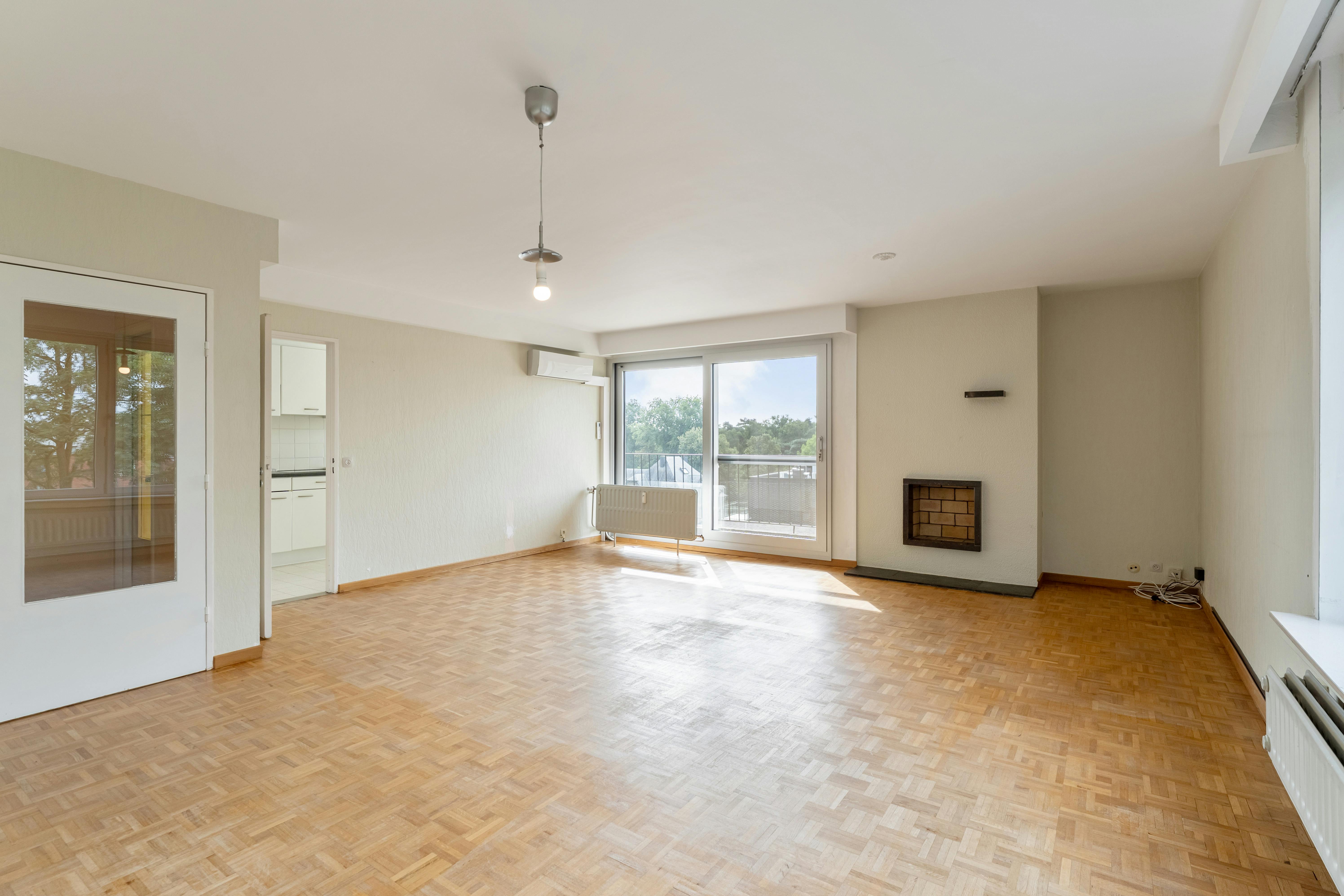 Ruim 3-slaapkamerappartement met terras en garagebox in hartje Genk foto 4