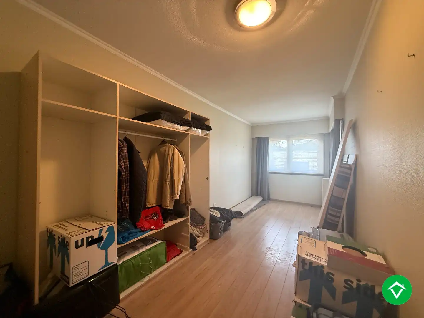 Rustig gelegen gelijkvloerse halfopen woning met 2 slpk's + dubbele garage foto 12