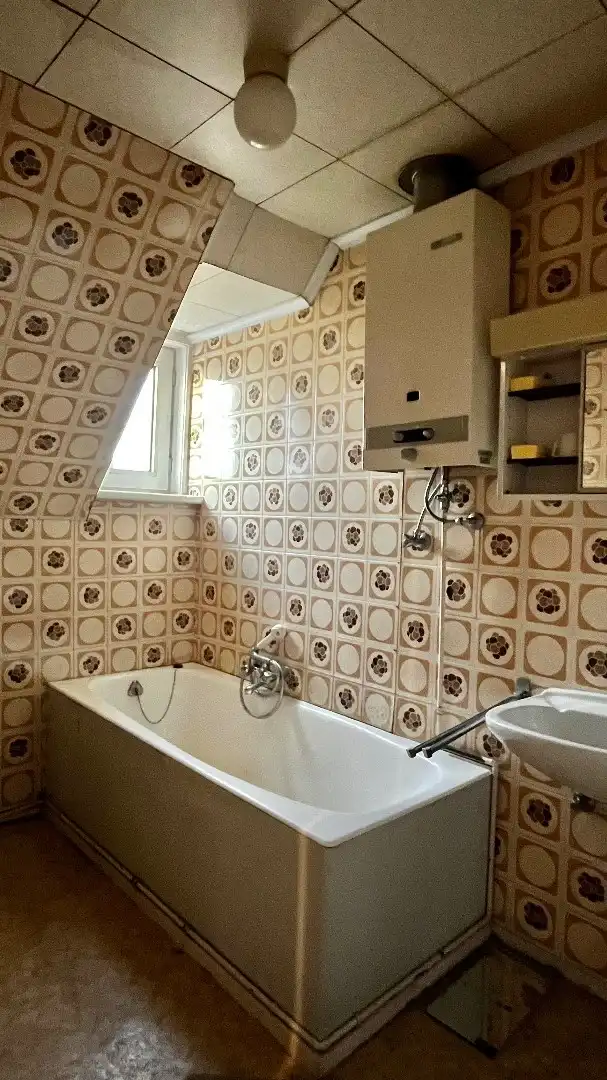 Halfopen woning met 3 kamers en een garage foto 13