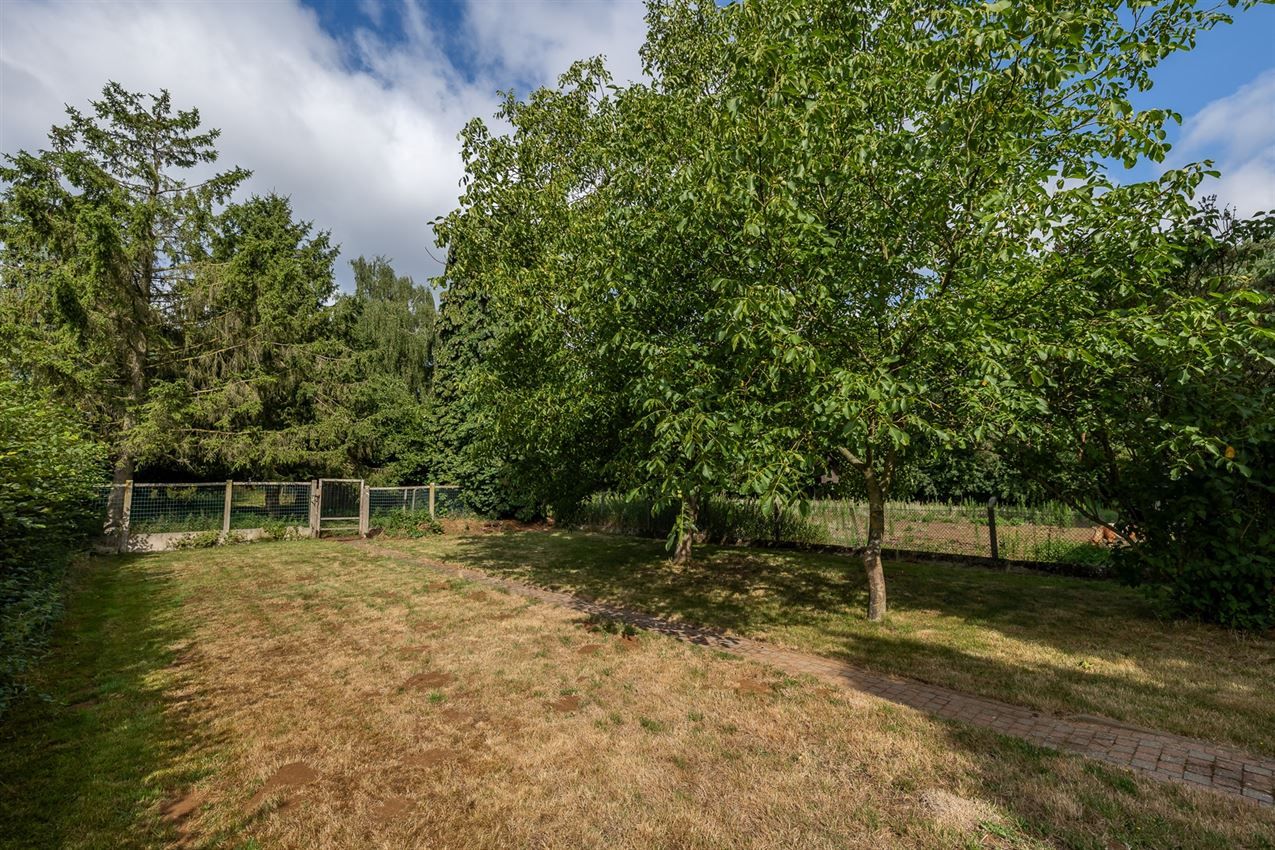 Vrijstaande woning met 3slk op 22a40ca op strategische ligging foto 32