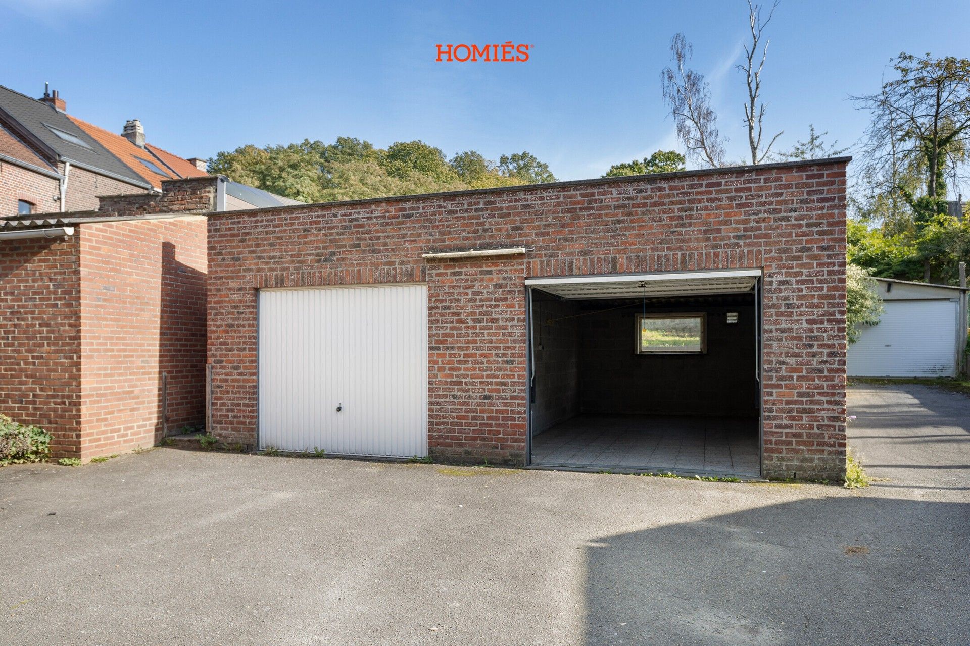 Woning met tuin en garage foto 12