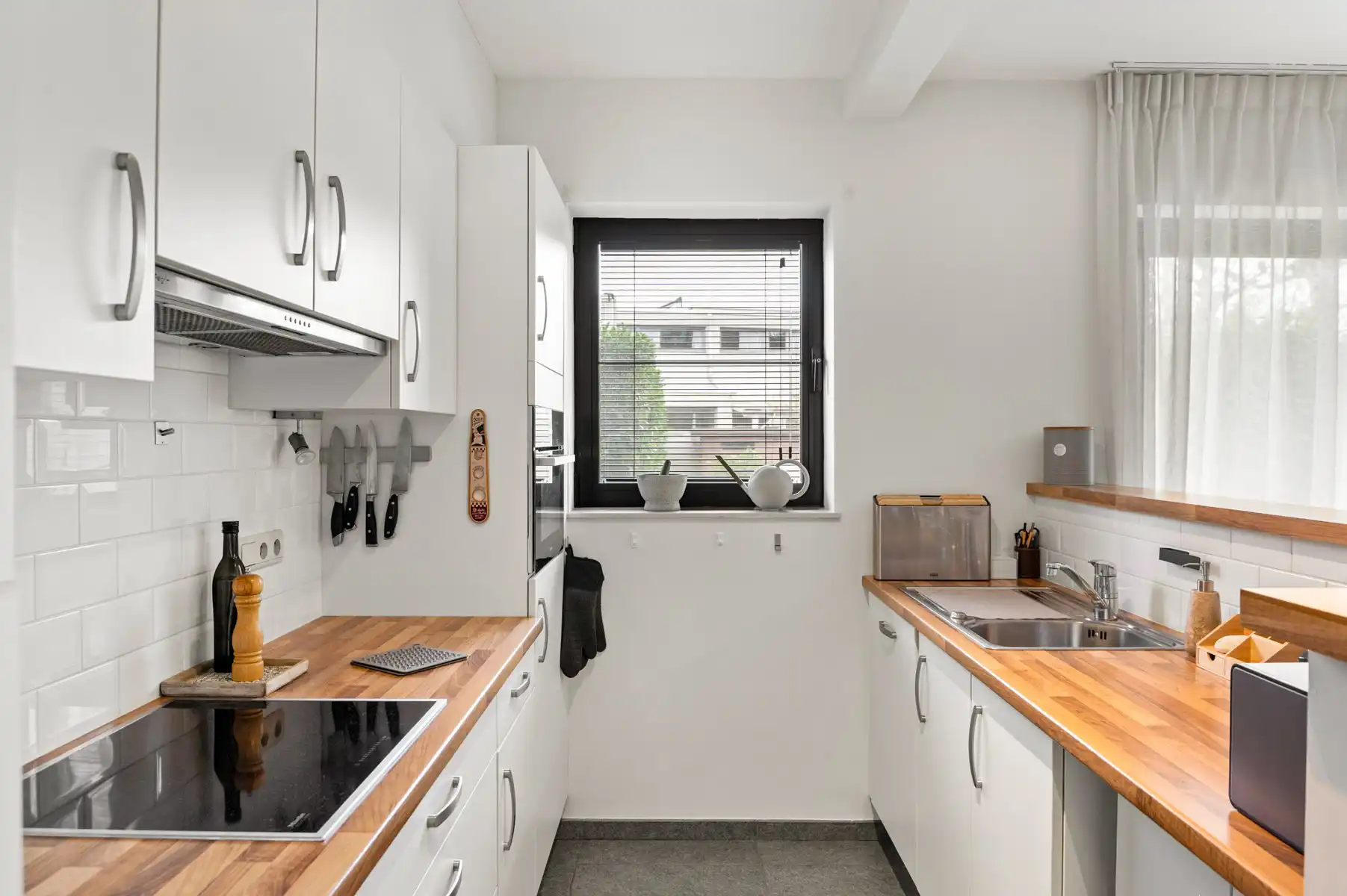 Gelijkvloers appartement met tuin en staanplaats foto 10