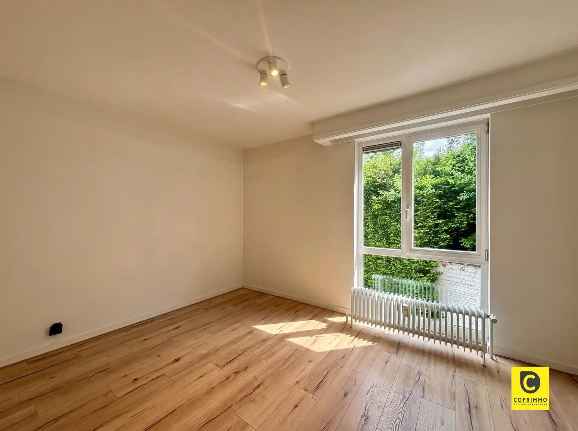 Instapklaar 3 slaapkamer appartement met zonnig terras, kelder en fietsenberging foto 10