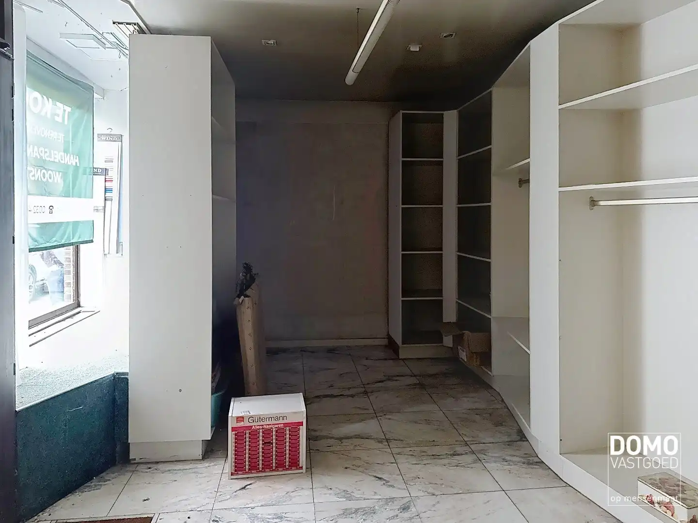 Te renoveren handelshuis gelegen in het centrum van Diepenbeek. foto 16