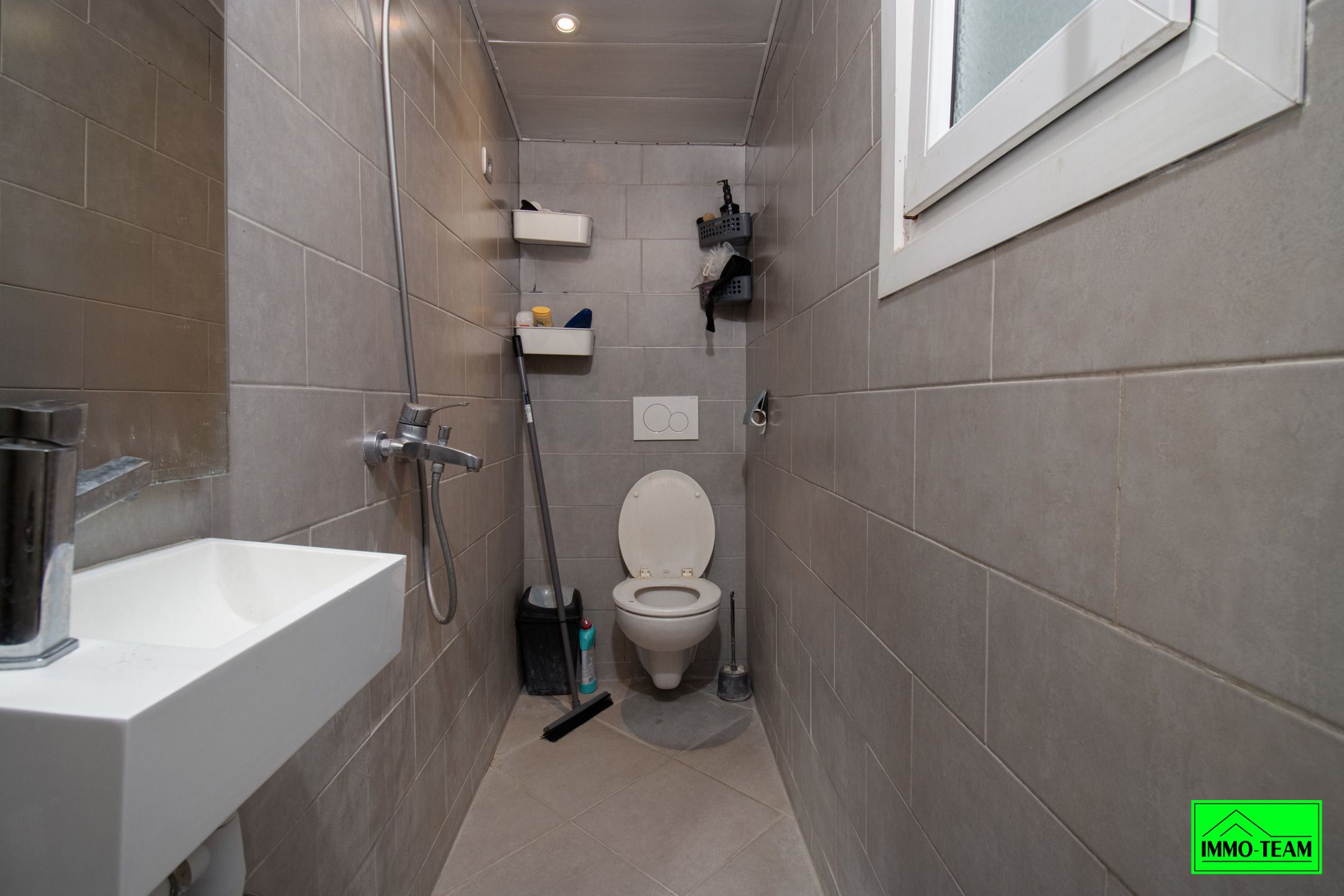 Opbrengsteigendom met handelszaak en 2 duplexappartementen foto 11