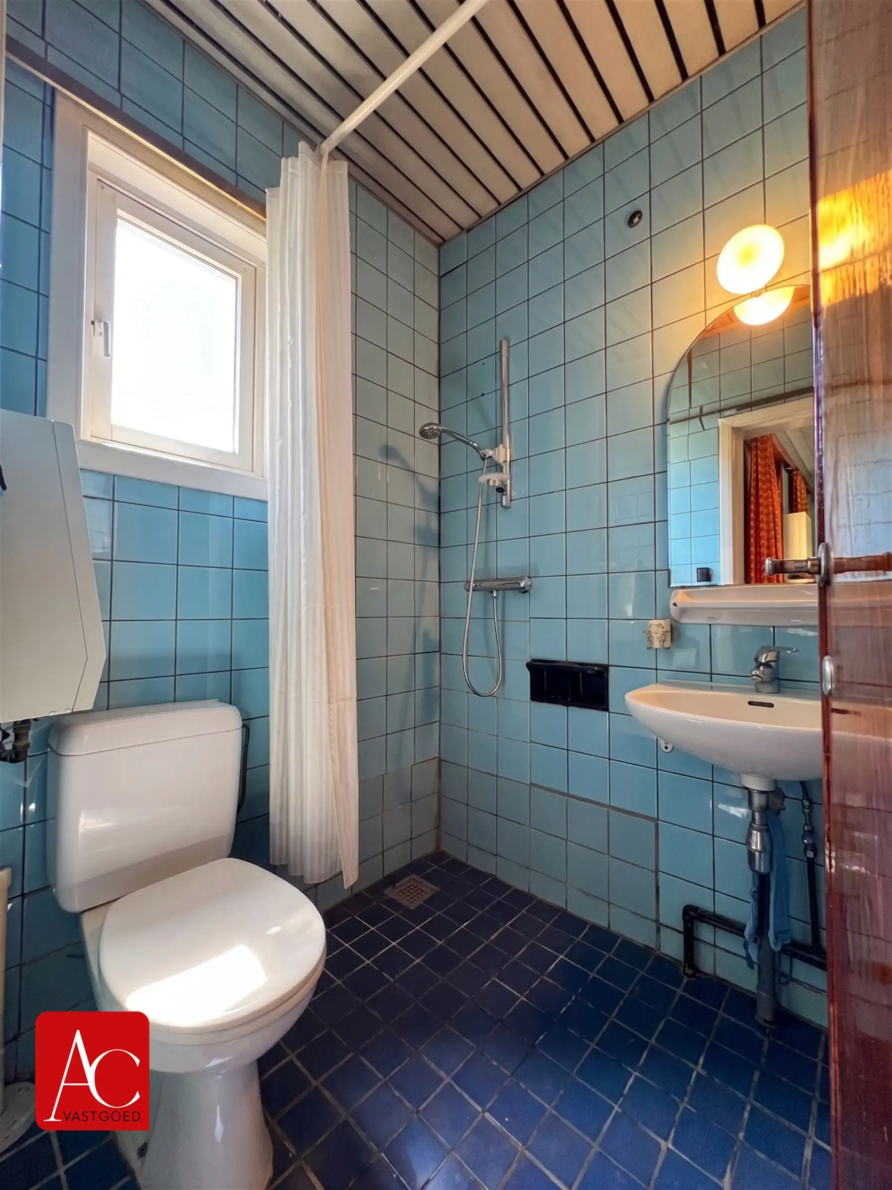Goed gelegen woning met tuin ter renovatie foto 7
