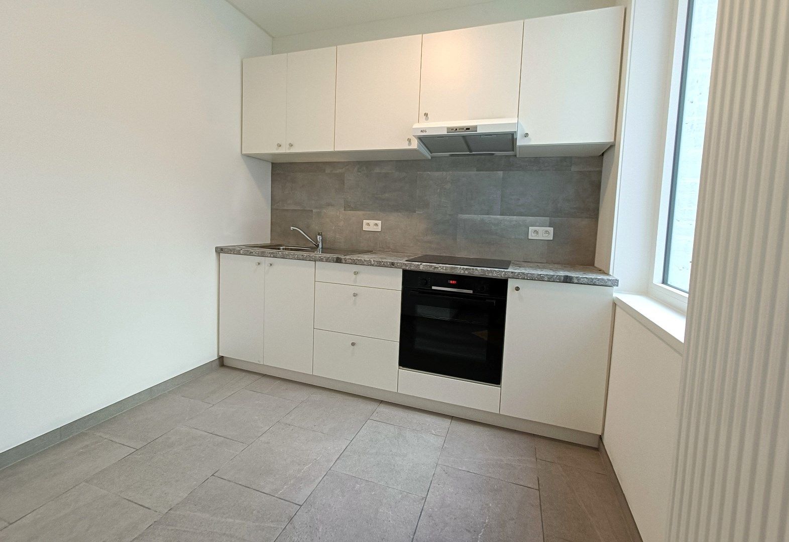 VERNIEUWDE RIJWONING MET STADSTUIN foto 4