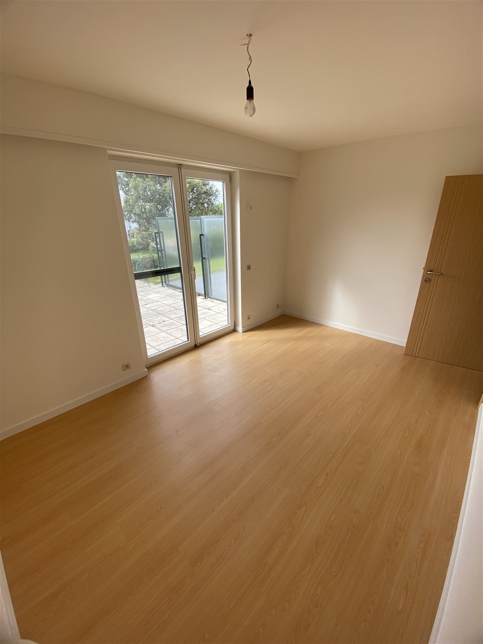 gelijkvloers appartement met garage foto 12