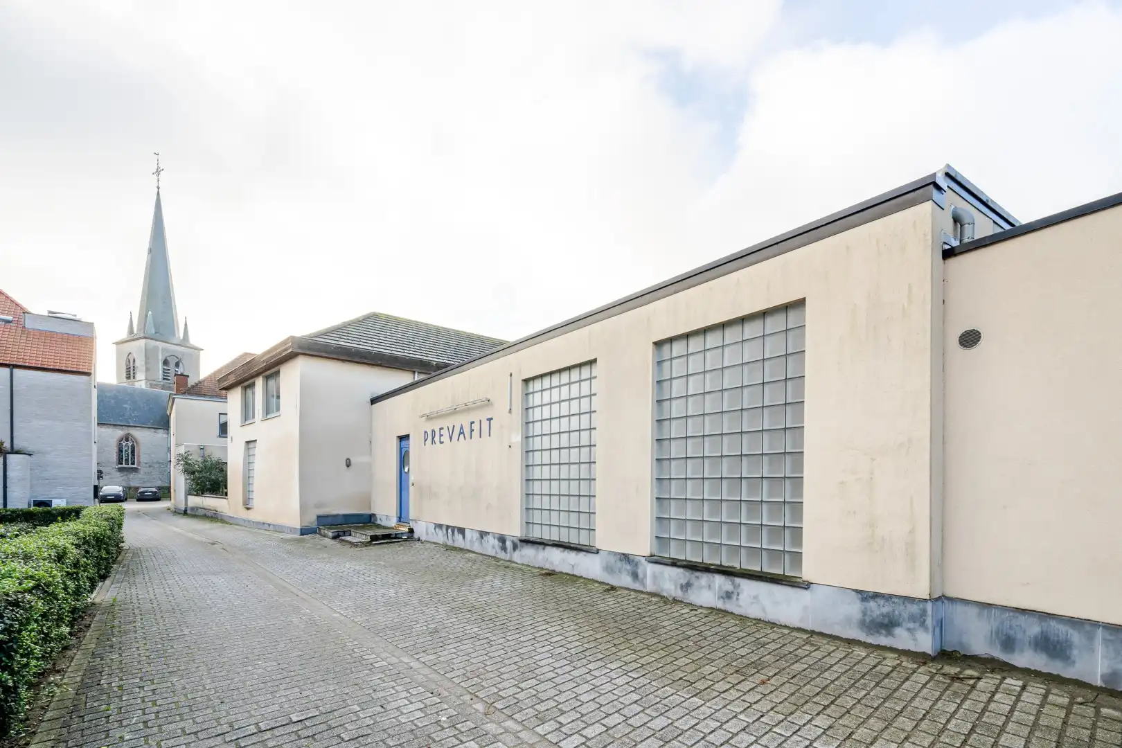 Ruim veelzijdig handelspand met woonst in hartje Kruisem foto 7