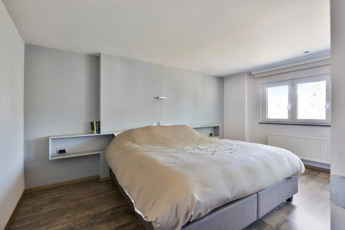 Energiezuinige en instapklare woning met 3 slpkrs in As centrum foto 18