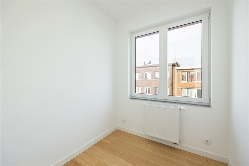 Gerenoveerde woning met zuidgerichte tuin foto 24