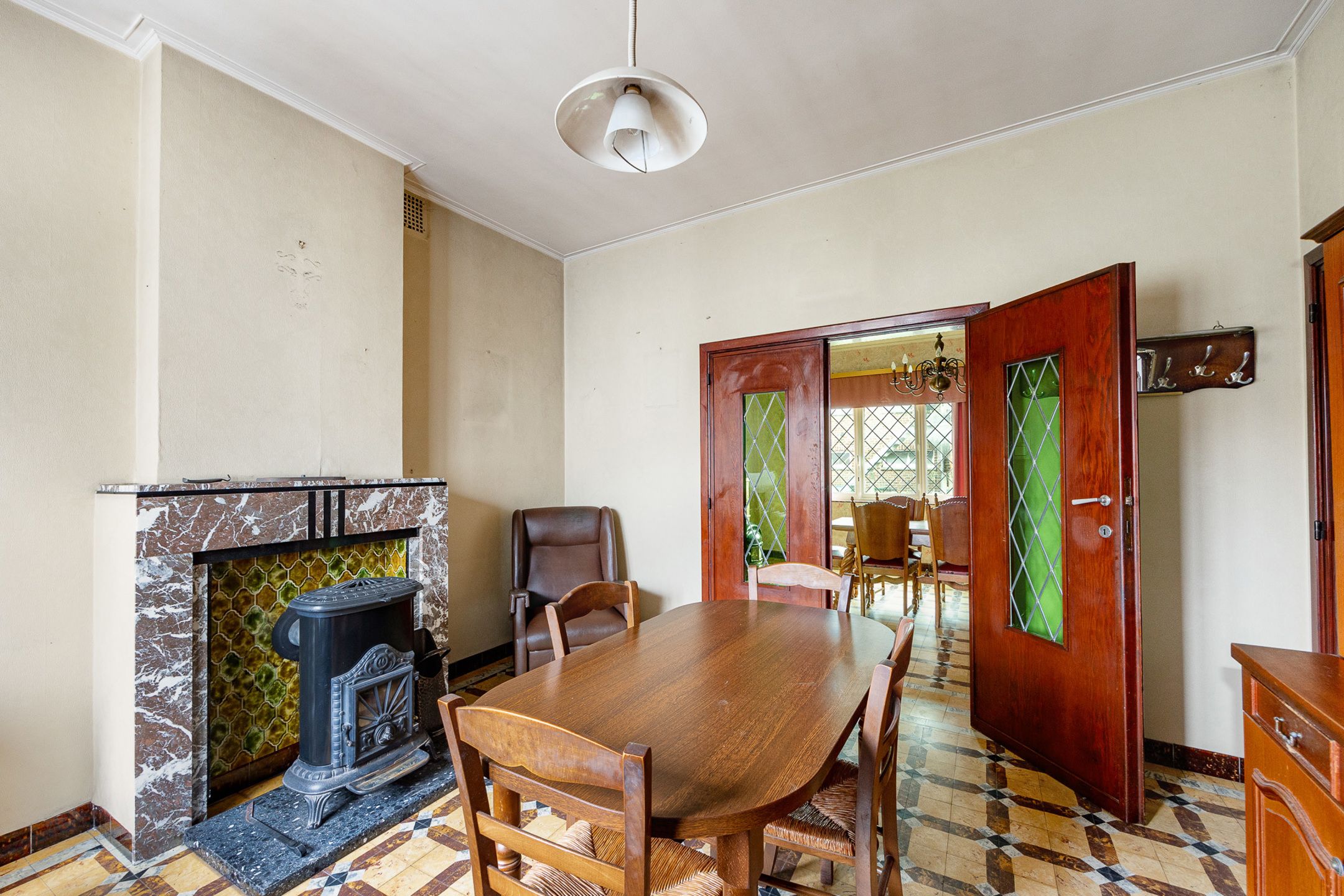 te renoveren 3-gevel woning met tuin foto 6