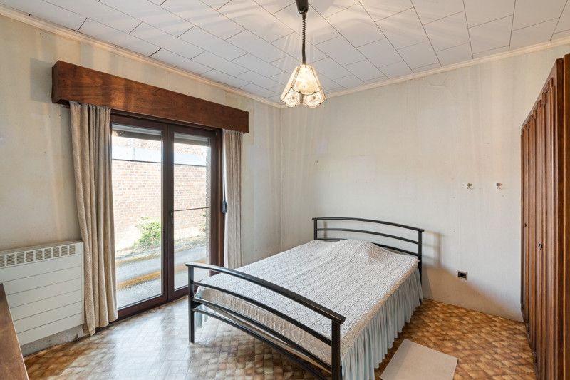 Gelijkvloerse woning met grote loods achteraan op 25are foto 25