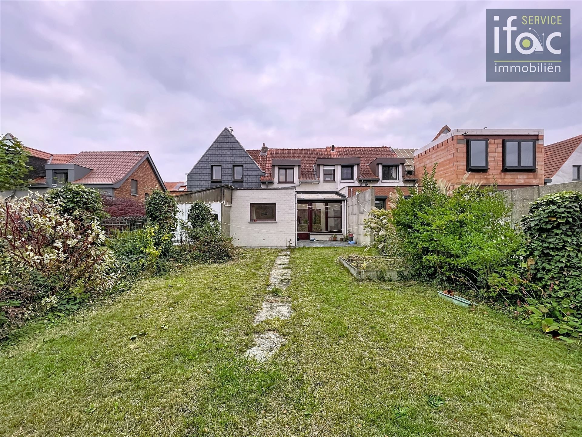 Rijwoning met tuin  foto 19