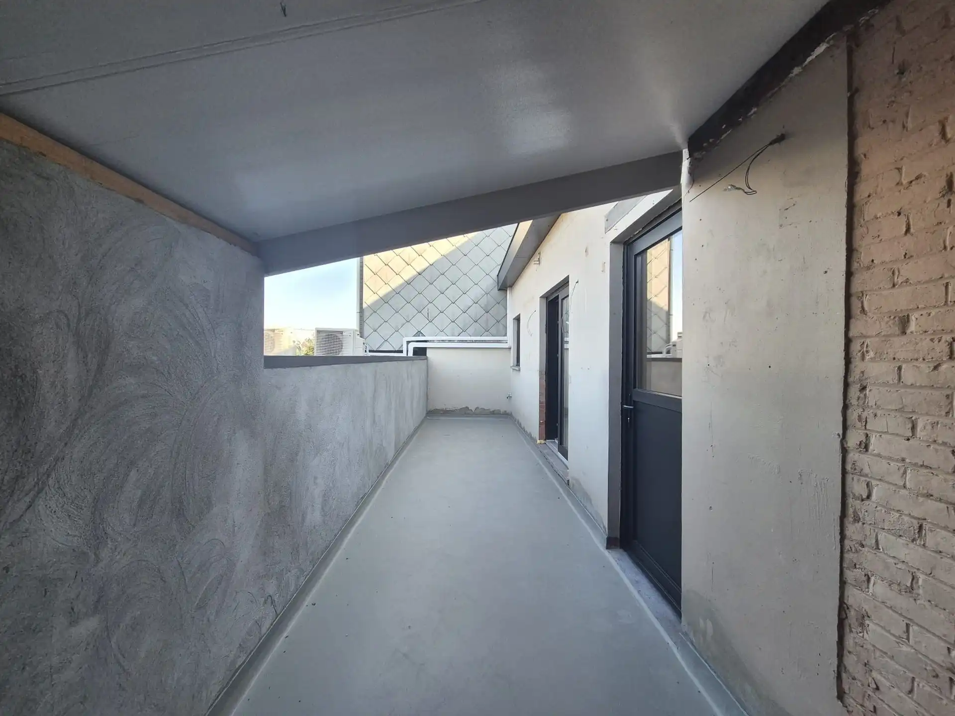 Ruim triplex appartement met polyvalente ruimte op toplocatie in het hart van Wetteren foto 26