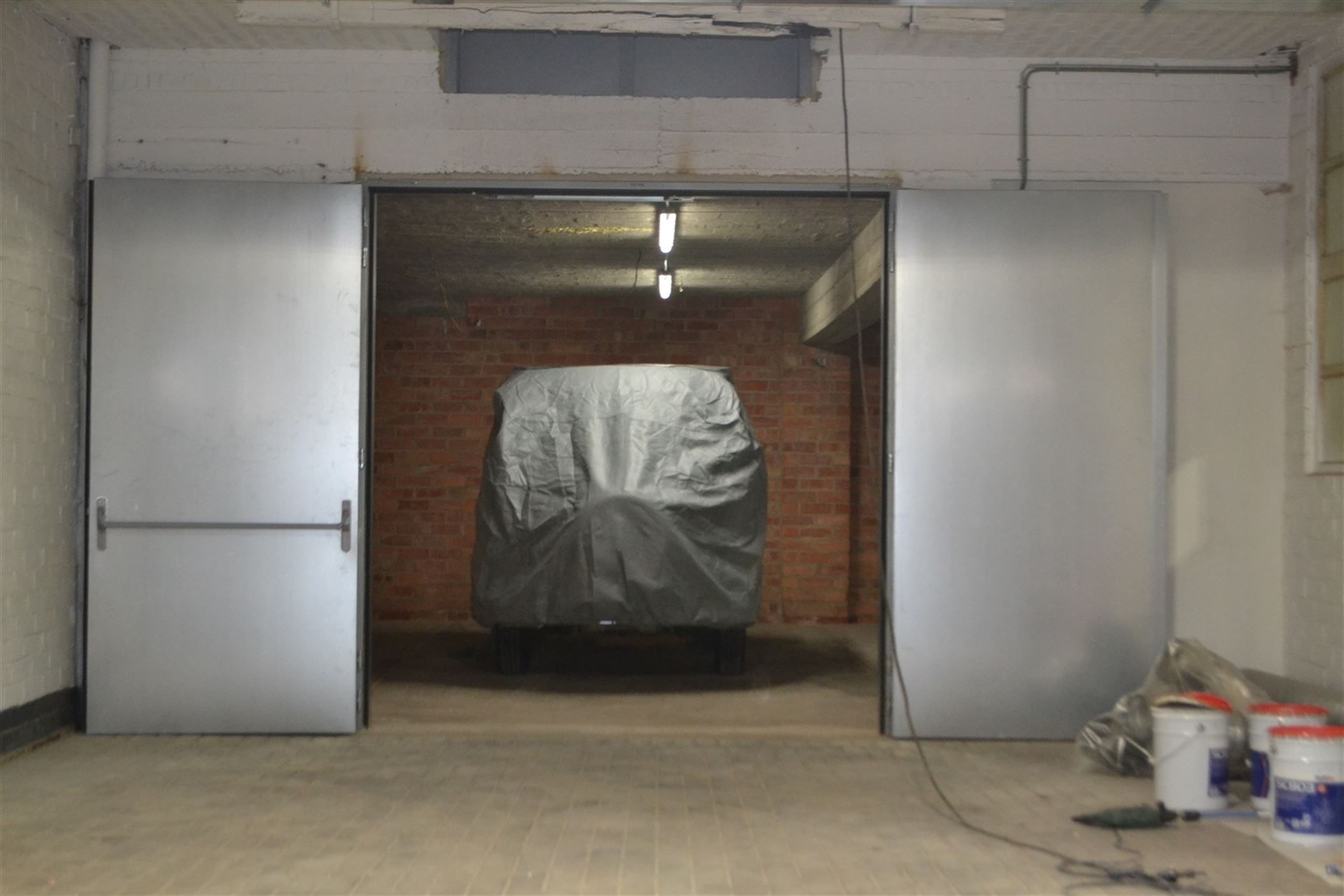 Afgesloten duplex stockage unit (+/- 128 m²). foto 5