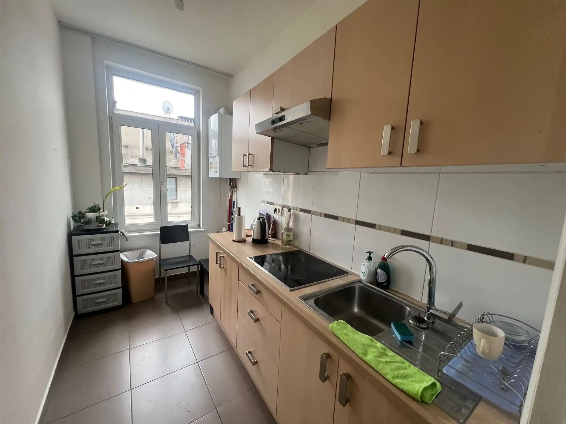 Opbrengsteigendom met commerciële gelijkvloers en 6 appartementen foto 11