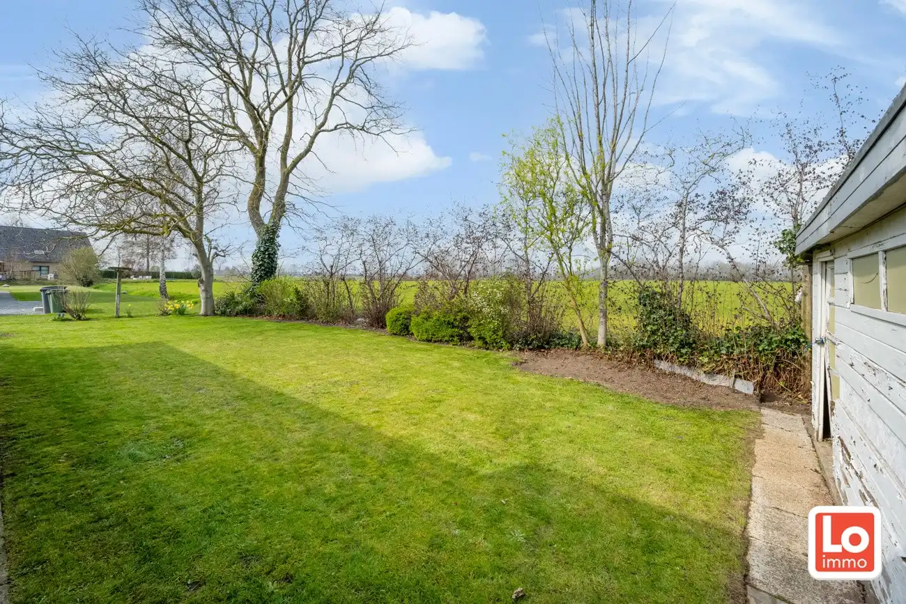 Ruime volledig te renoveren open gelijkvloerse prefab woning met inpandige garage en tuin met open zicht of perceel bouwgrond met afbraak/heropbouw mogelijkheden aan 6% BTW op een rustige locatie nabij het centrum van Zeveneken! foto 28