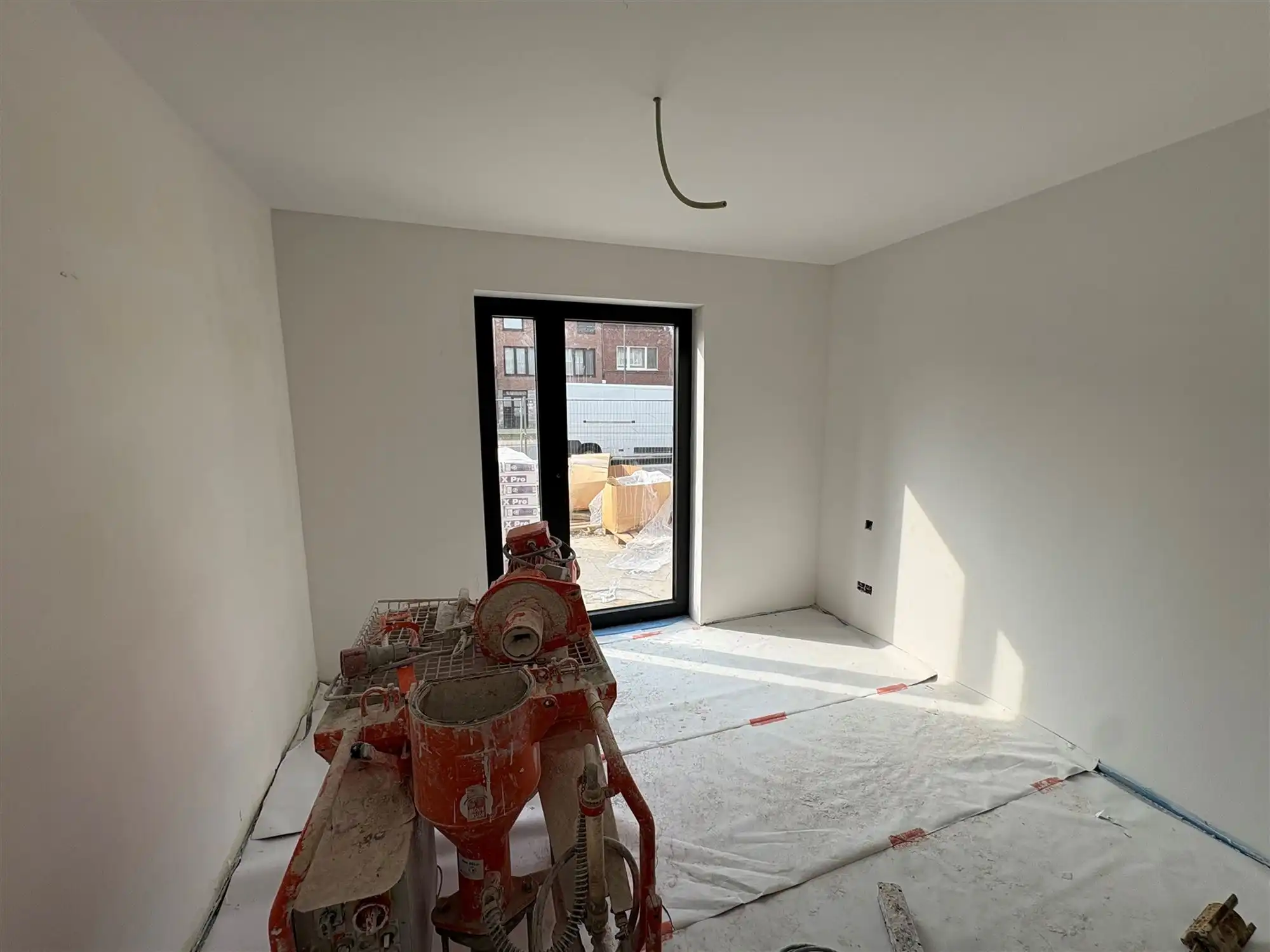 Gelijkvloersappartement met 2 slaapkamers en tuin. foto 9