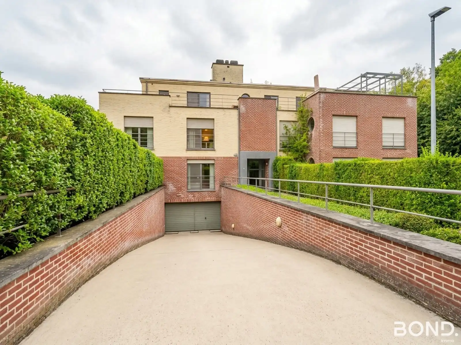 Twee autostaanplaatsen te koop in Heverlee!  foto {{pictureIndex}}