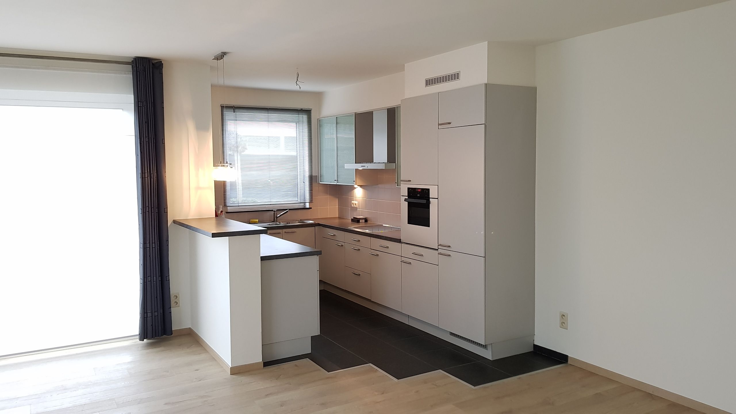 Modern gelijkvloers appartement te huur in Leuven foto 3