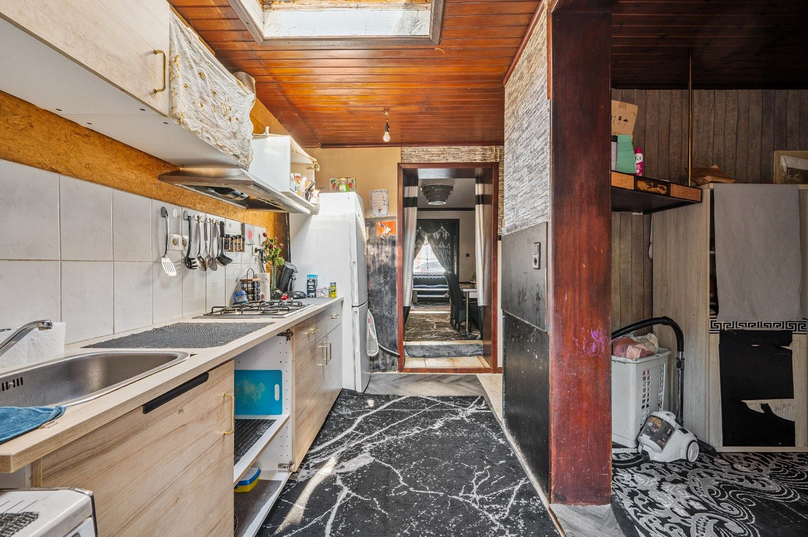 Te renoveren rijwoning met potentieel in de buitenrand van Tienen foto 11