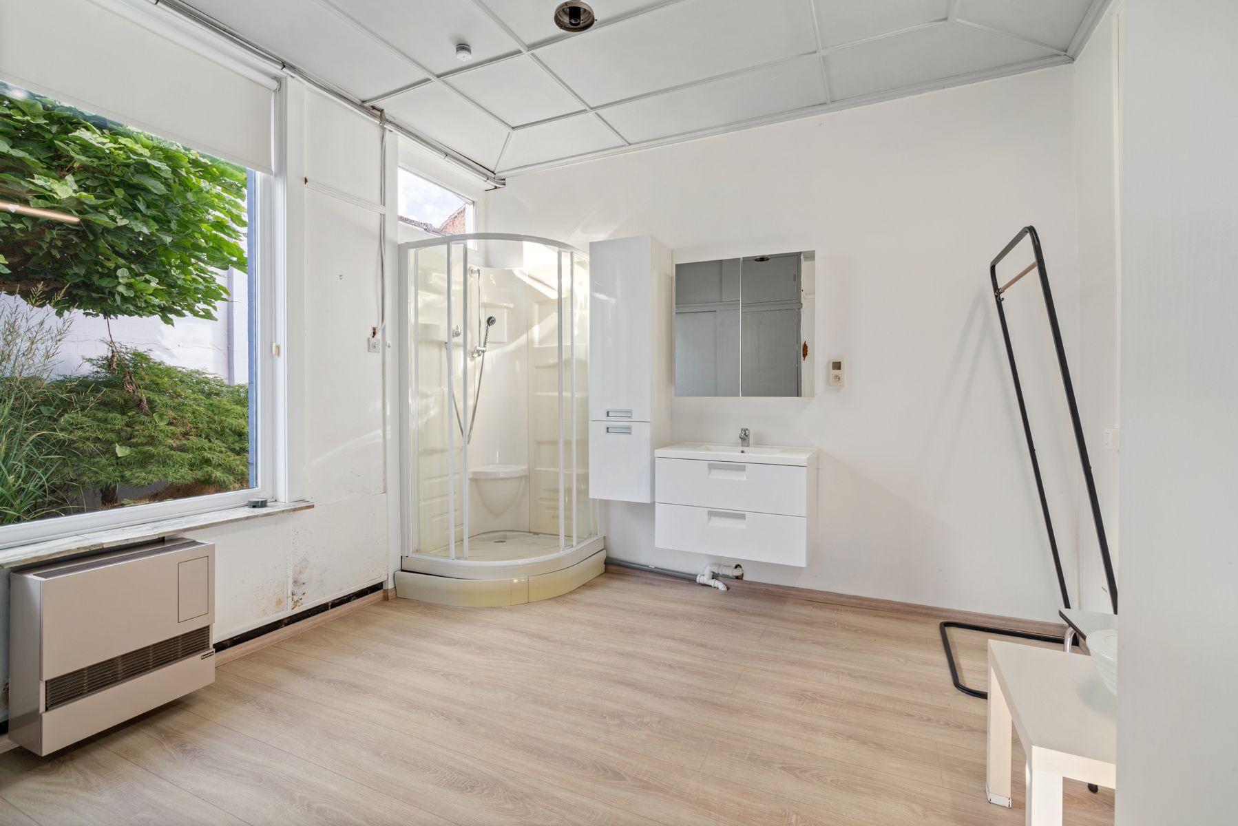 Karaktervolle ruime woning  met bijgebouw/atelier en stadstuin in het centrum foto 11