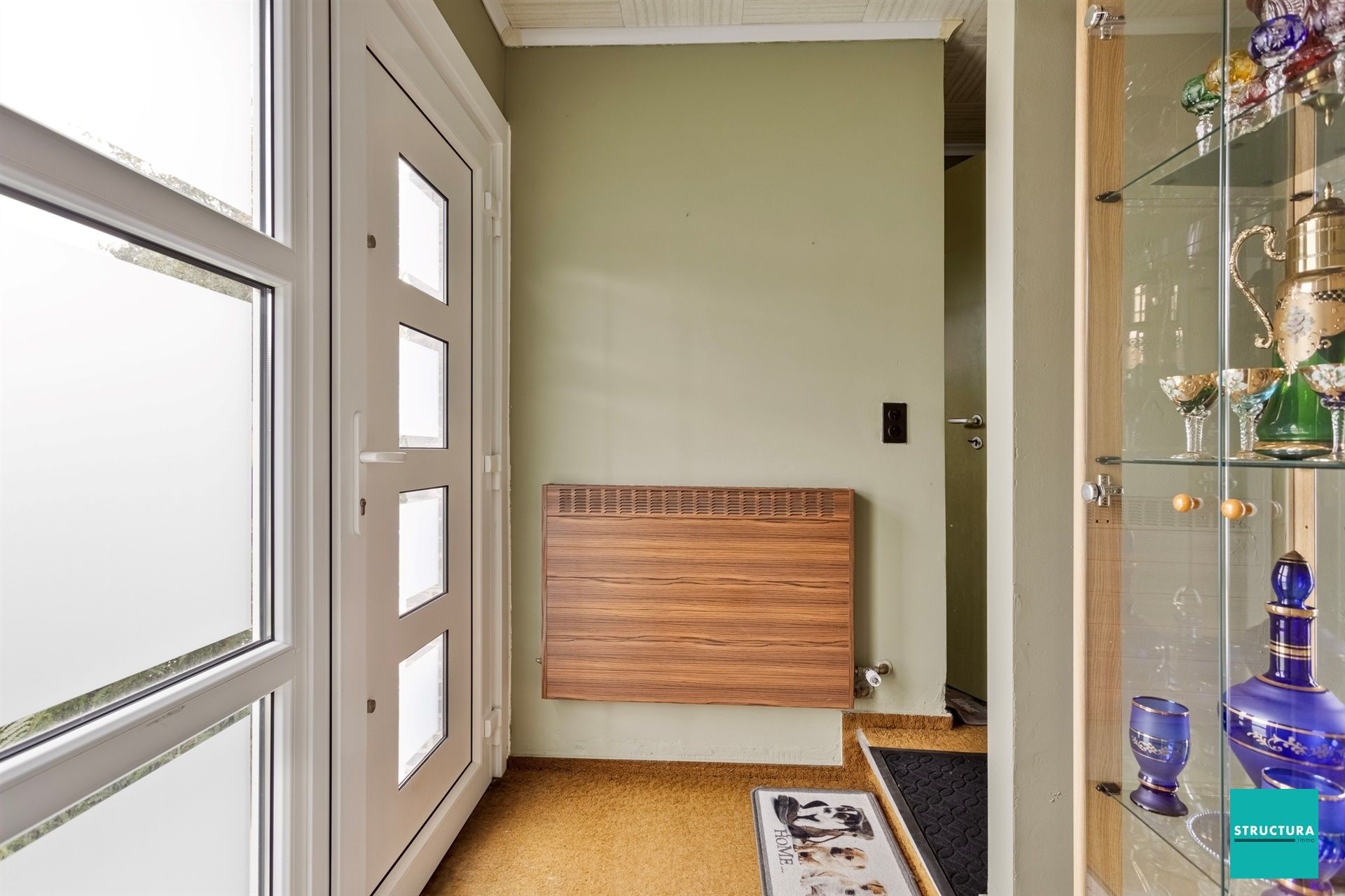 Driegevelwoning met zuid-west tuin in rustige straat foto 3