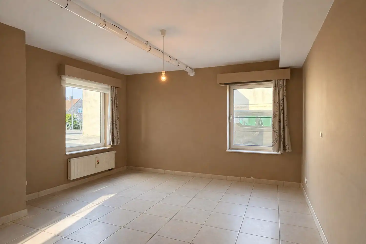 Instapklaar en energiezuinig ruim twee slaapkamer appartement in het centrum van Eke foto 6