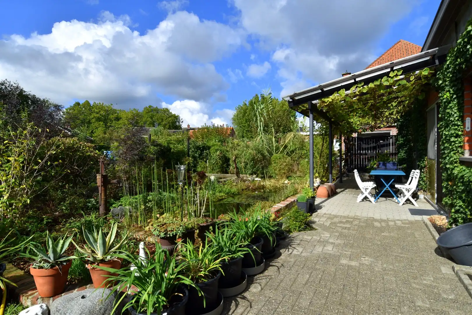 Charmante woning met 3 slaapkamers, 2 garages en een zalige tuin te koop in Gullegem! foto 21