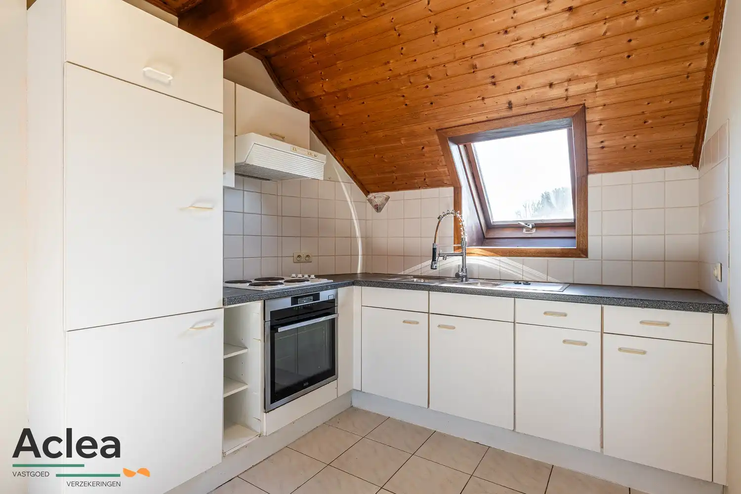 Instapklaar goed gelegen duplexappartement in centrum Eeklo foto 9